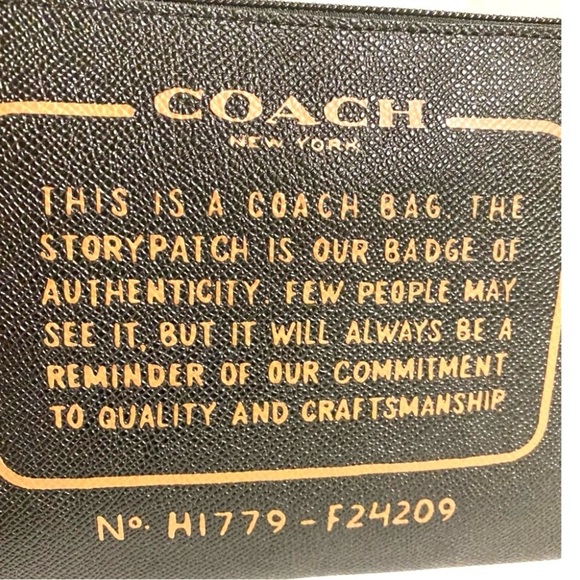 Coach black saffiano leather wristlet